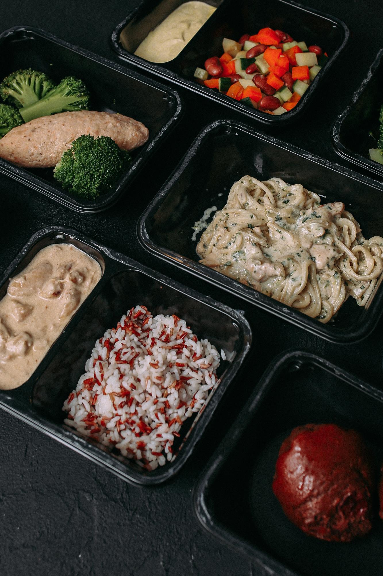 Tray of plated lunch boxes prepared for delivery