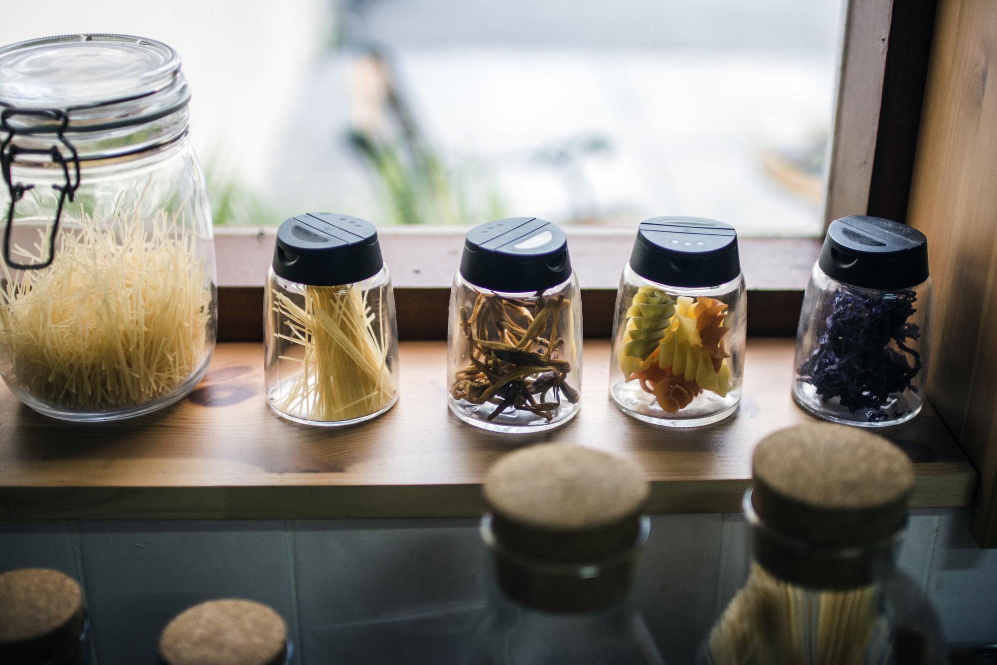 Close-up of ingredient prep with labelled containers